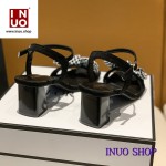 Zapatillas de tacon alto con nudo de moño